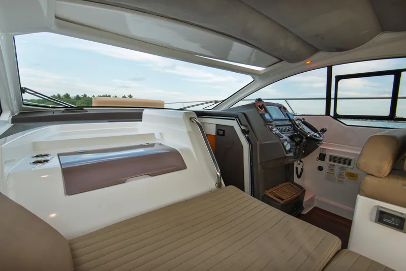  Yacht Photos Pics 2016 Azimut Atlantis 43 yacht interior with modern cockpit and comfortable seating.