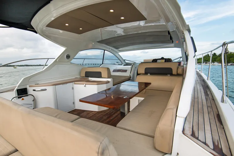  Yacht Photos Pics Luxurious 2016 Azimut Atlantis 43 yacht interior with elegant seating and wooden table.