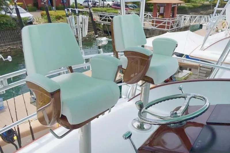 Satis Fly Yacht Photos Pics Captain's chairs and steering wheel on 2020 Maverick Yachts Costa Rica 50 Sportfish.