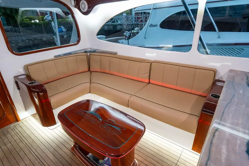 Satis Fly Yacht Photos Pics Luxurious interior of 2020 Maverick Yachts Costa Rica 50 Sportfish with elegant seating and wooden accents.
