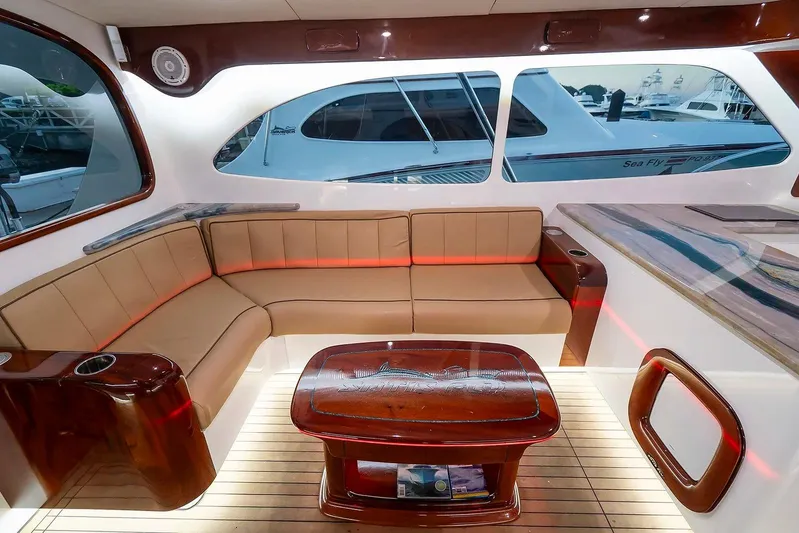 Satis Fly Yacht Photos Pics Luxurious interior of 2020 Maverick Yachts Costa Rica 50 Sportfish with elegant seating and wooden accents.