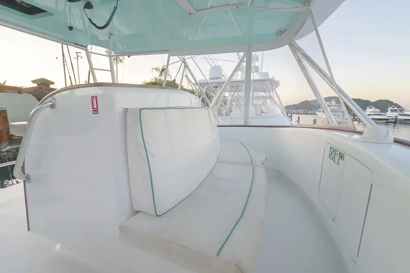 Satis Fly Yacht Photos Pics Luxurious seating on 2020 Maverick Yachts Costa Rica 50 Sportfish, docked at marina.