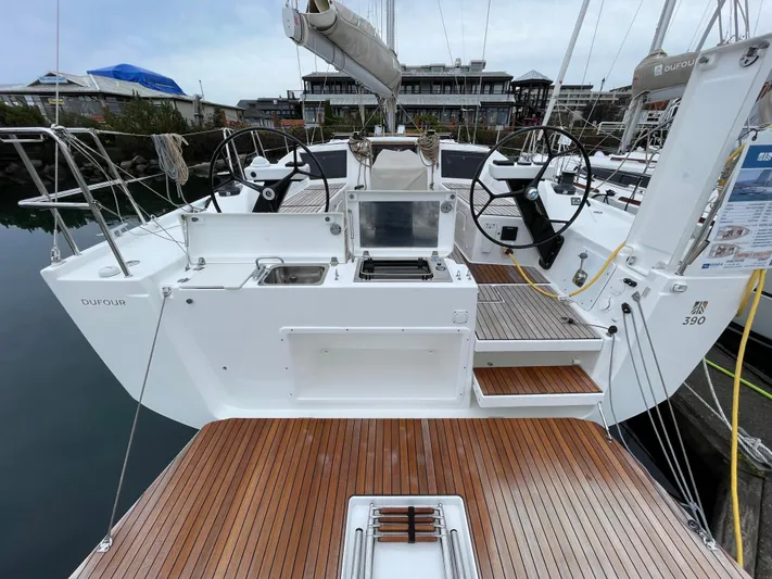 Yacht Photos Pics 2022 Dufour 390 Grand Prix sailboat with dual helm, teak deck, and modern cockpit design.