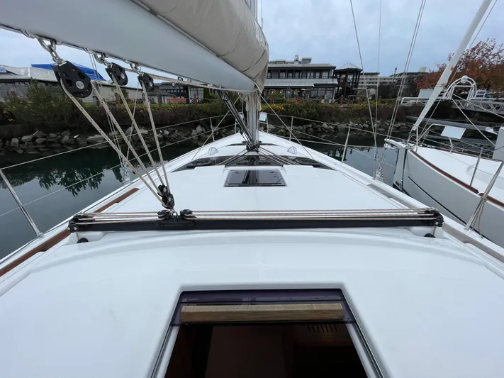  Yacht Photos Pics 2022 Dufour 390 Grand Prix sailboat deck view at marina.