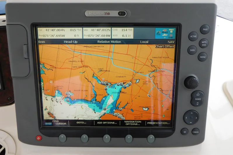 Why Knot Yacht Photos Pics Navigation system on a 2003 Sea Ray 480 Sedan Bridge displaying a nautical chart.