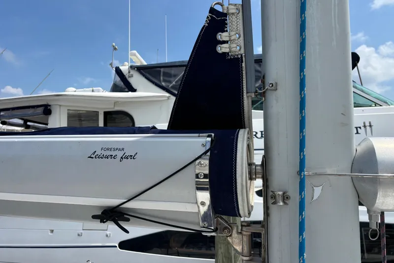  Yacht Photos Pics Catalina 42 MkII 2006 sailboat with Forespar Leisure Furl system, docked under clear skies.