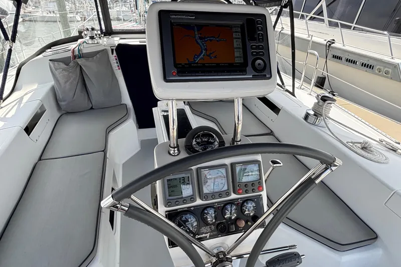  Yacht Photos Pics Cockpit of 2006 Catalina 42 MkII sailboat with navigation instruments and steering wheel.