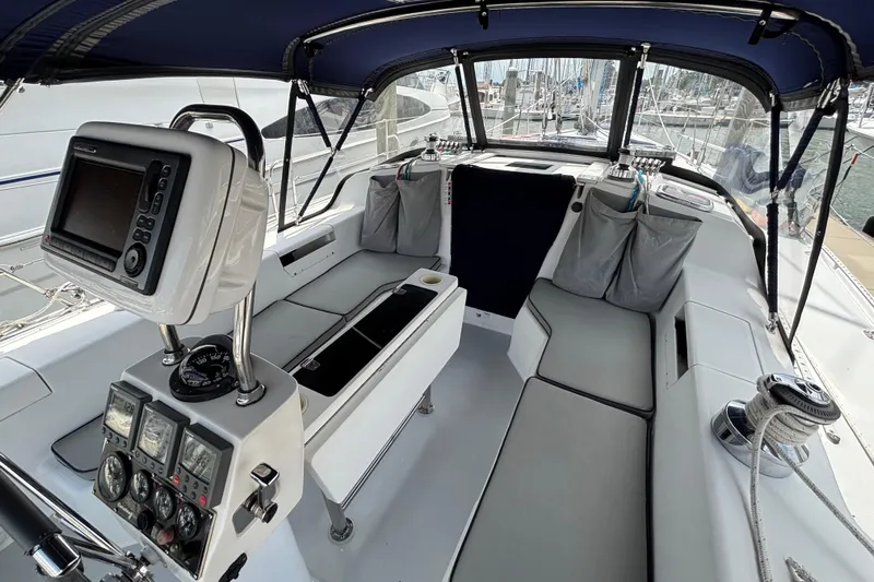  Yacht Photos Pics Cockpit of 2006 Catalina 42 MkII sailboat with navigation equipment and seating.