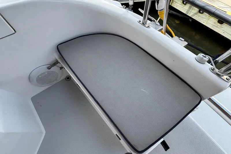  Yacht Photos Pics Cushioned seating area on a 2006 Catalina 42 MkII sailboat deck.