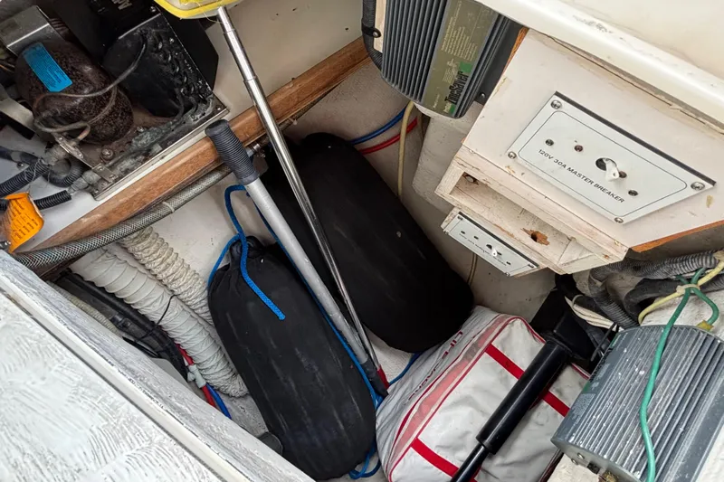  Yacht Photos Pics Storage compartment of a 2006 Catalina 42 MkII sailboat with equipment and wiring.