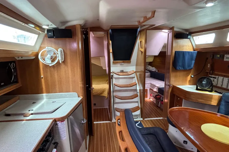  Yacht Photos Pics Interior of a 2006 Catalina 42 MkII sailboat, featuring a cozy cabin layout.