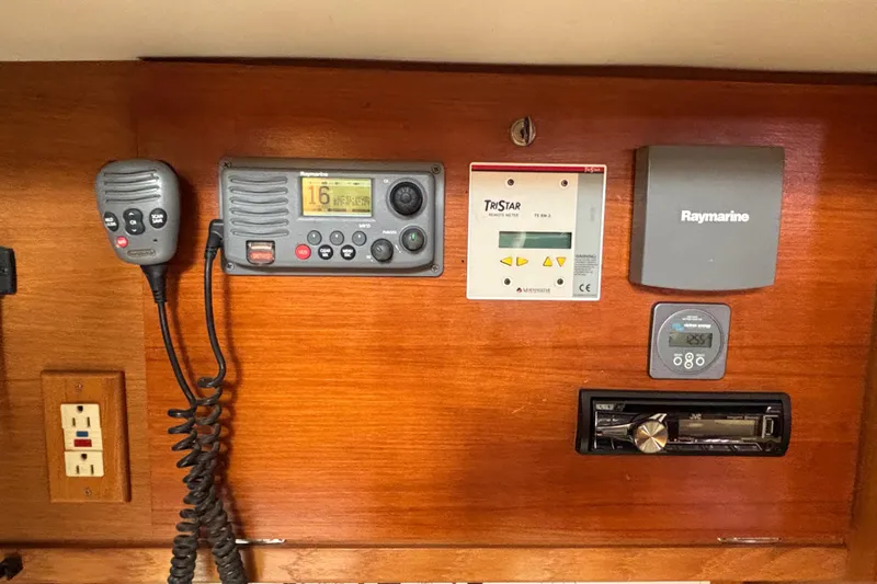  Yacht Photos Pics Control panel of a 2006 Catalina 42 MkII sailboat with communication and navigation equipment.