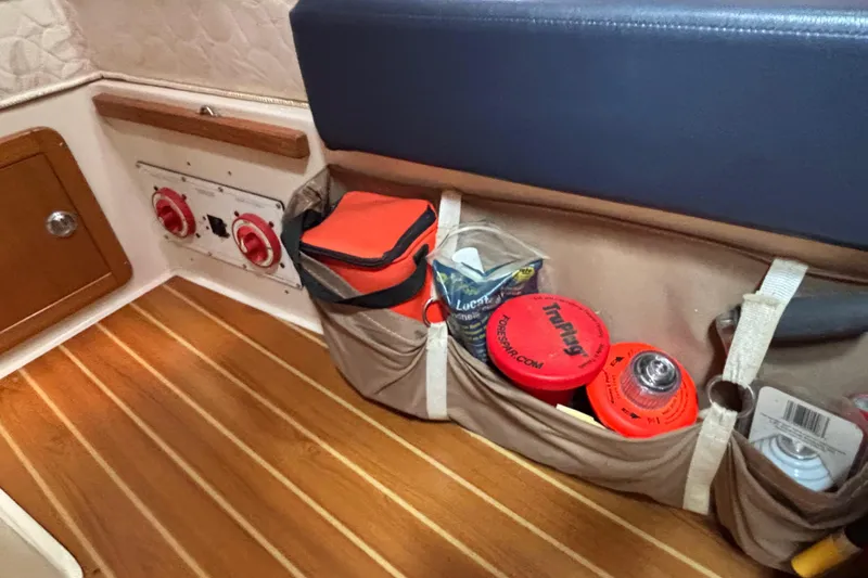  Yacht Photos Pics Interior of 2006 Catalina 42 MkII sailboat with storage pockets and wooden flooring.