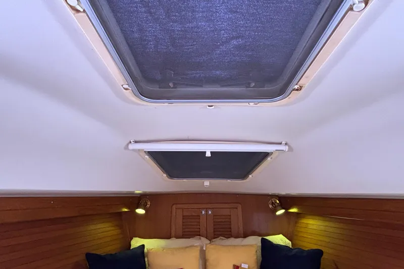  Yacht Photos Pics Interior cabin of 2006 Catalina 42 MkII sailboat with skylights and cozy bedding.