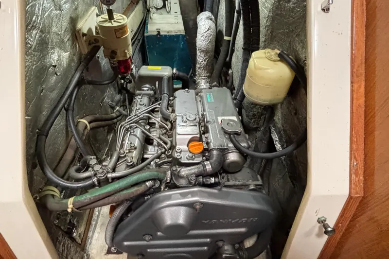  Yacht Photos Pics Engine compartment of a 2006 Catalina 42 MkII sailboat, showcasing mechanical components.