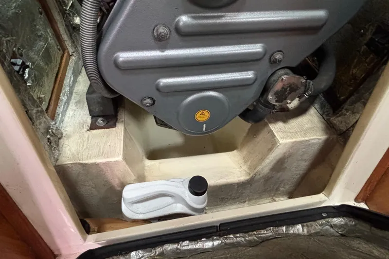  Yacht Photos Pics Engine compartment of a 2006 Catalina 42 MkII sailboat, showing mechanical components.