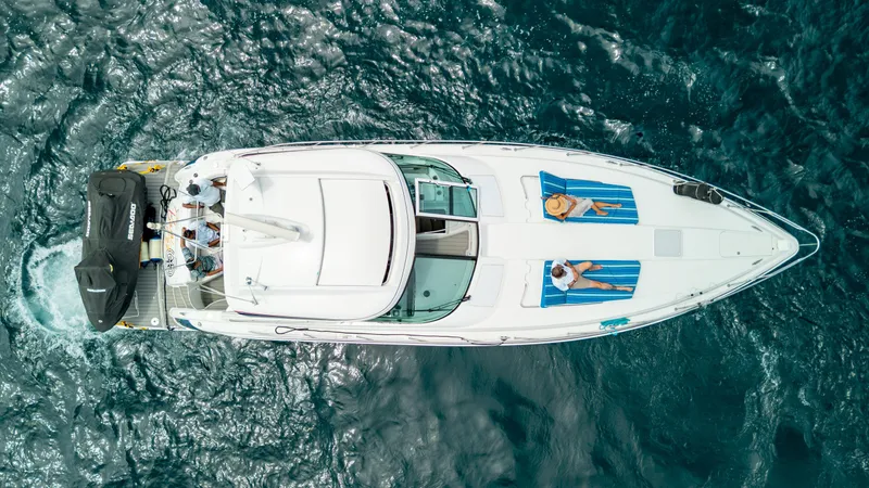 Baja 22 With Dry Storage In Cabo San Lucas Yacht Photos Pics Aerial view of 2007 Formula 45 Yacht cruising with sunbathers on deck.
