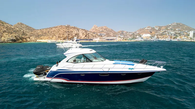 Baja 22 With Dry Storage In Cabo San Lucas Yacht Photos Pics 2007 Formula 45 Yacht cruising in scenic coastal waters.