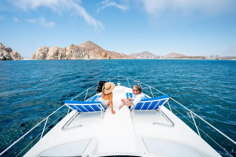 Baja 22 With Dry Storage In Cabo San Lucas Yacht Photos Pics 2007 Formula 45 Yacht cruising with two people relaxing, scenic ocean and mountain view.