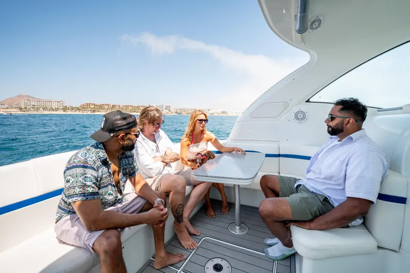 Baja 22 With Dry Storage In Cabo San Lucas Yacht Photos Pics Group relaxing on 2007 Formula 45 Yacht, enjoying sunny day at sea.