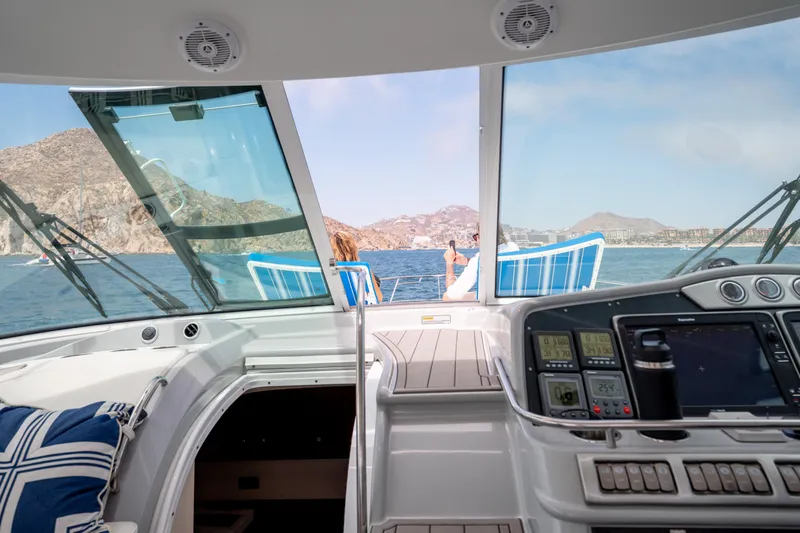 Baja 22 With Dry Storage In Cabo San Lucas Yacht Photos Pics Interior view of 2007 Formula 45 Yacht with ocean and mountain backdrop.