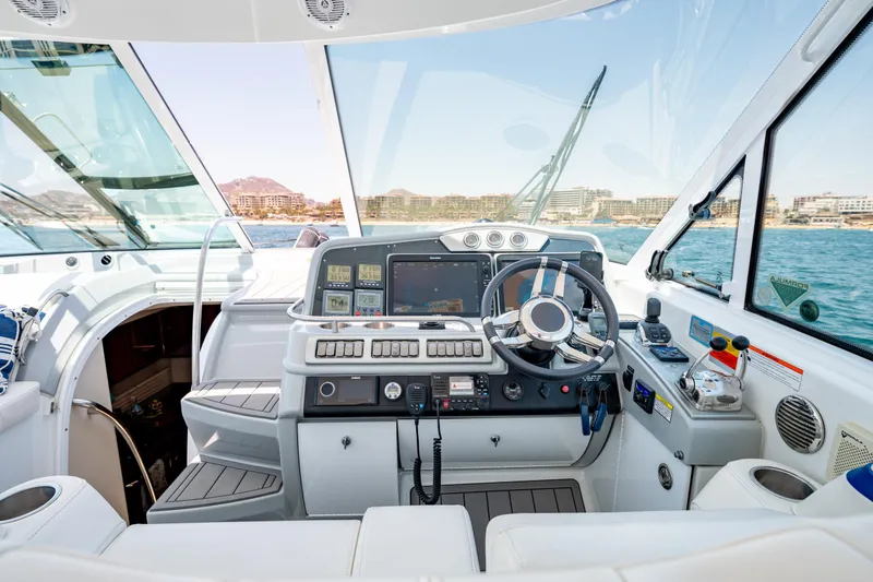 Baja 22 With Dry Storage In Cabo San Lucas Yacht Photos Pics Interior cockpit of a 2007 Formula 45 Yacht with modern navigation equipment.