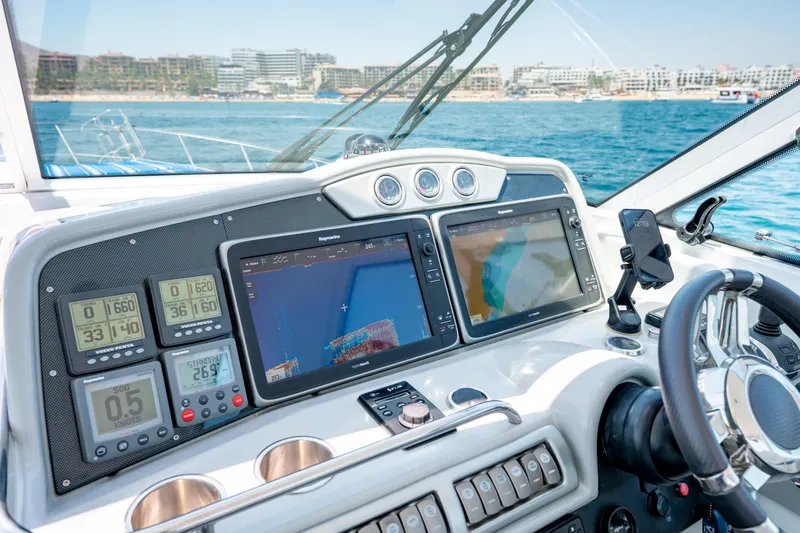 Baja 22 With Dry Storage In Cabo San Lucas Yacht Photos Pics Control panel of a 2007 Formula 45 Yacht with navigation screens and gauges.