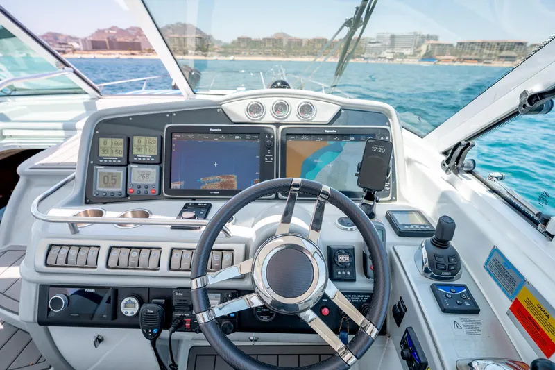 Baja 22 With Dry Storage In Cabo San Lucas Yacht Photos Pics 2007 Formula 45 Yacht cockpit with advanced navigation systems and ocean view.
