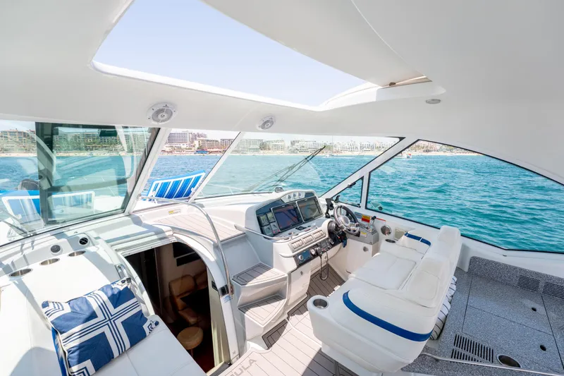 Baja 22 With Dry Storage In Cabo San Lucas Yacht Photos Pics 2007 Formula 45 Yacht interior with helm, seating, and ocean view.
