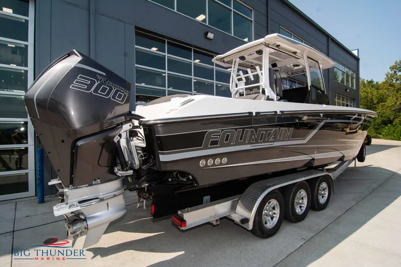  Yacht Photos Pics Fountain 32 NX 2022 boat with powerful outboard motor.