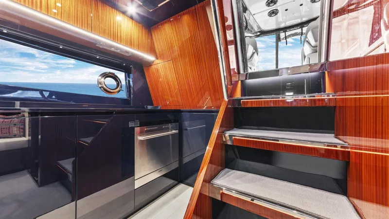 Wegu The Great Yacht Photos Pics Luxurious interior of 2023 Riva Dolceriva yacht with sleek wood finishes and ocean view.