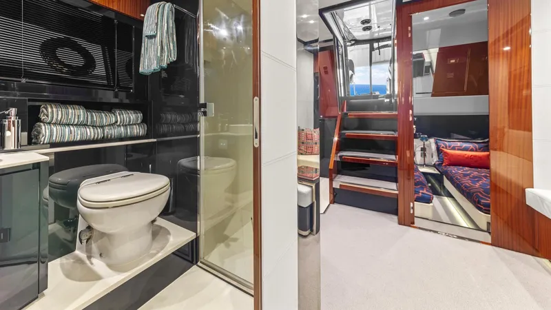 Wegu The Great Yacht Photos Pics Luxurious 2023 Riva Dolceriva yacht interior with modern bathroom and cozy cabin.