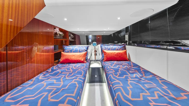 Wegu The Great Yacht Photos Pics Luxurious 2023 Riva Dolceriva yacht cabin with twin beds and modern decor.