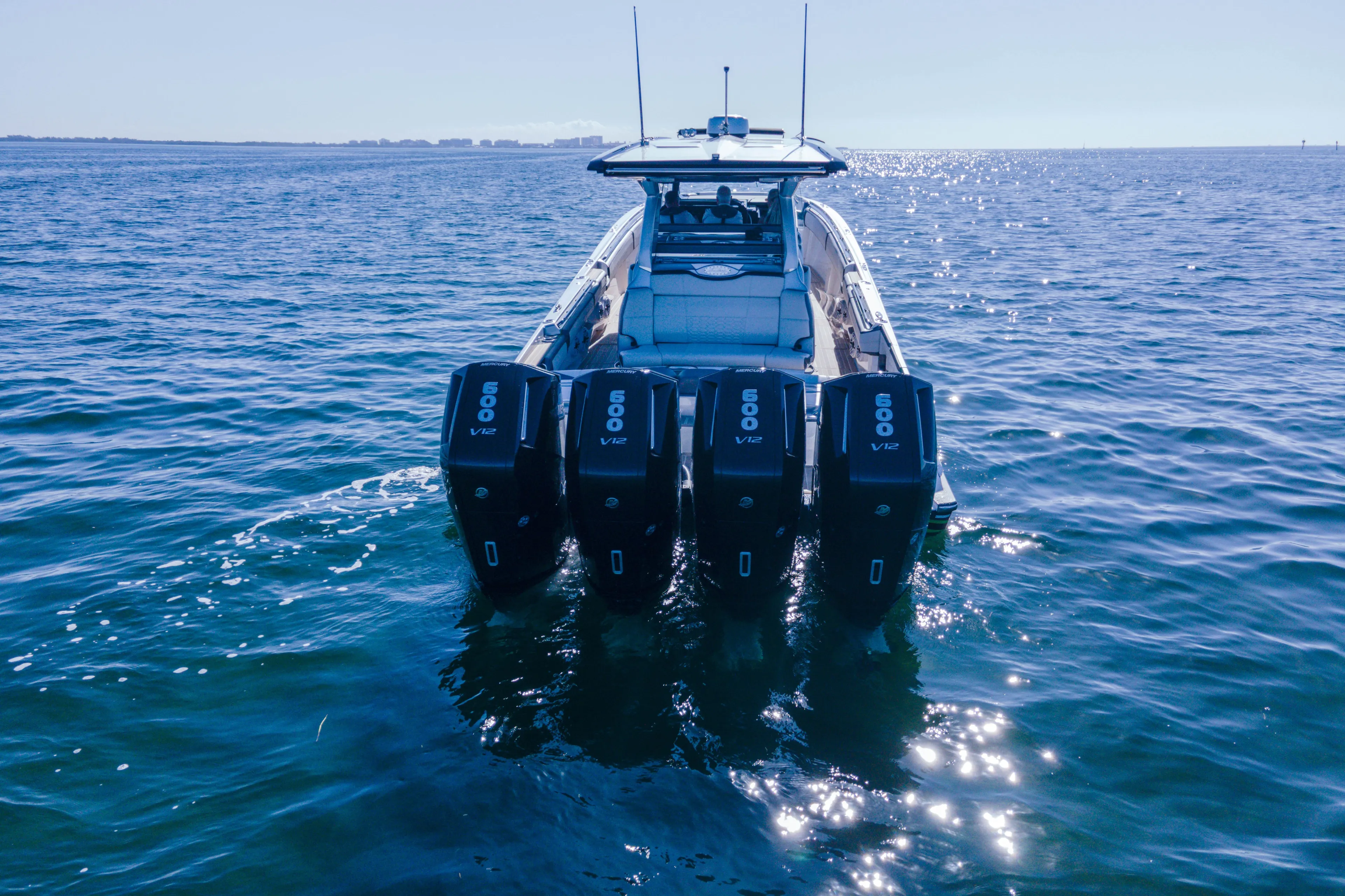  Yacht Photos Pics 2024 Nor-Tech 500 Sport Center Console with quad 600 V12 engines on open water.