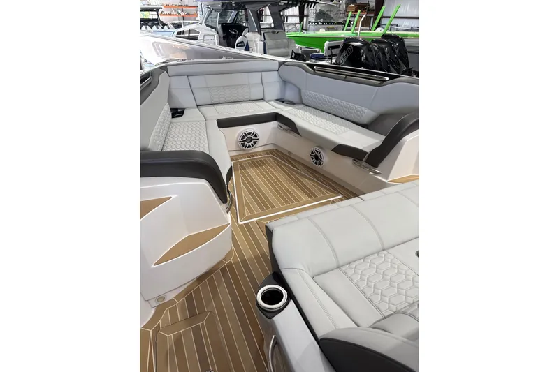  Yacht Photos Pics 2024 Nor-Tech boat interior with luxurious seating and modern design.