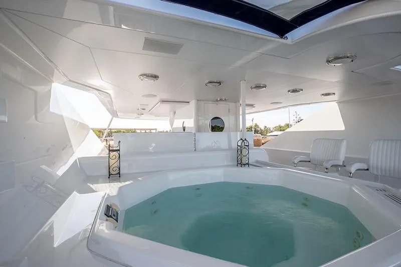 Never Enough Yacht Photos Pics Luxurious hot tub on the 1992 Feadship 140 Tri-Deck yacht.