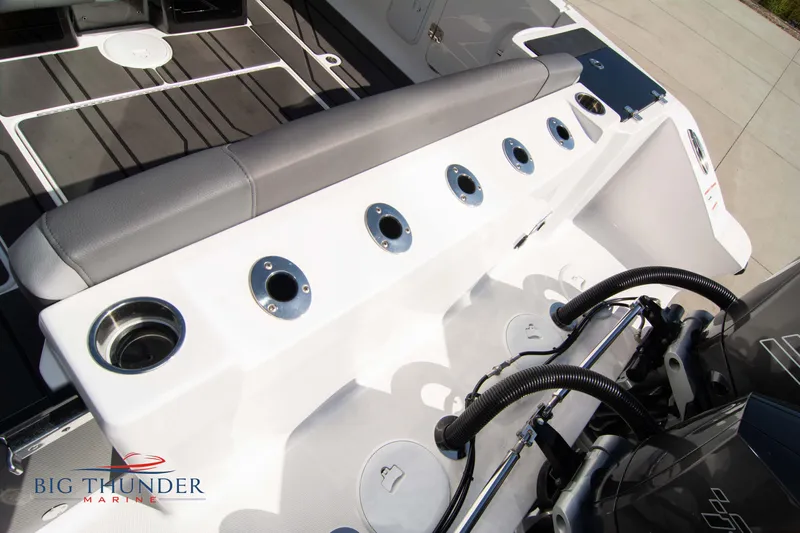  Yacht Photos Pics Fountain 32 NX 2022 boat with fishing rod holders and engines.