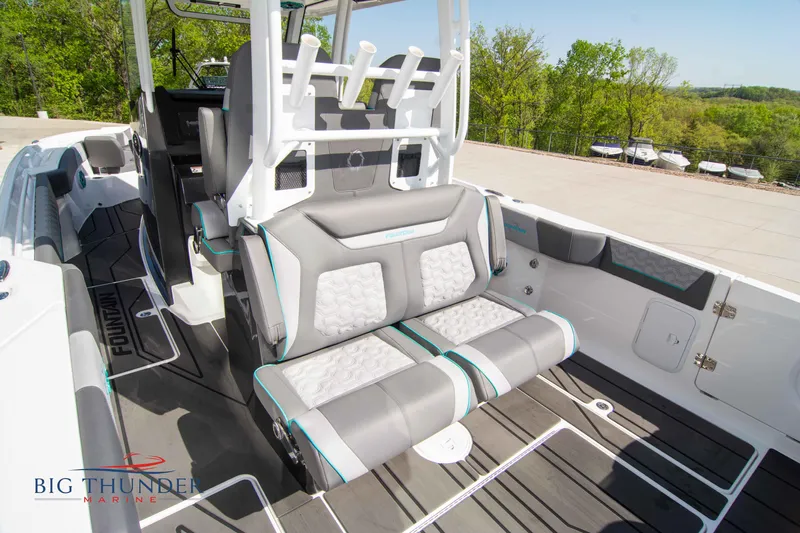  Yacht Photos Pics Interior of a 2022 Fountain 32 NX boat with luxurious seating.
