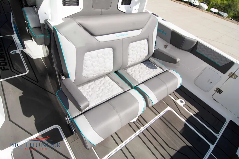  Yacht Photos Pics Interior of 2022 Fountain 32 NX with gray and white seating.