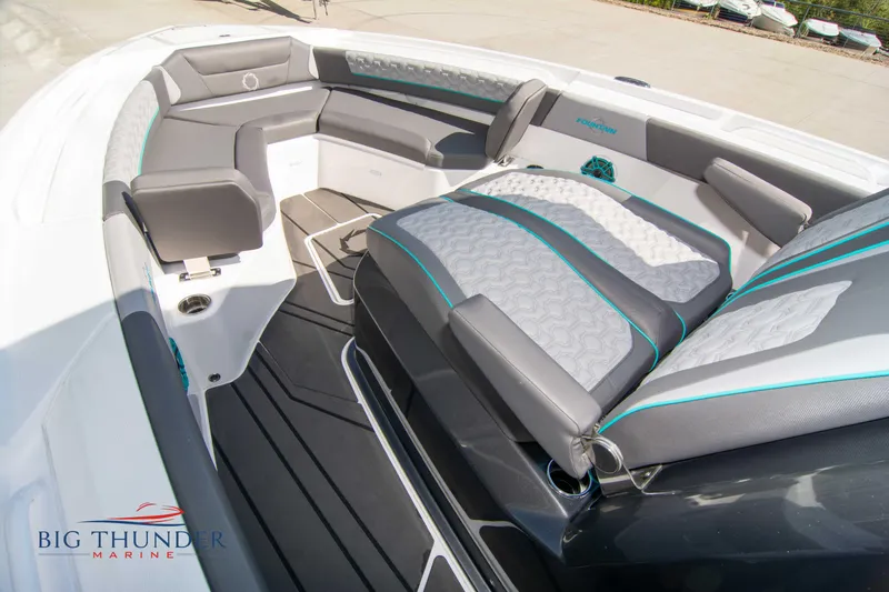  Yacht Photos Pics Interior of a 2022 Fountain 32 NX boat with gray and blue seating.