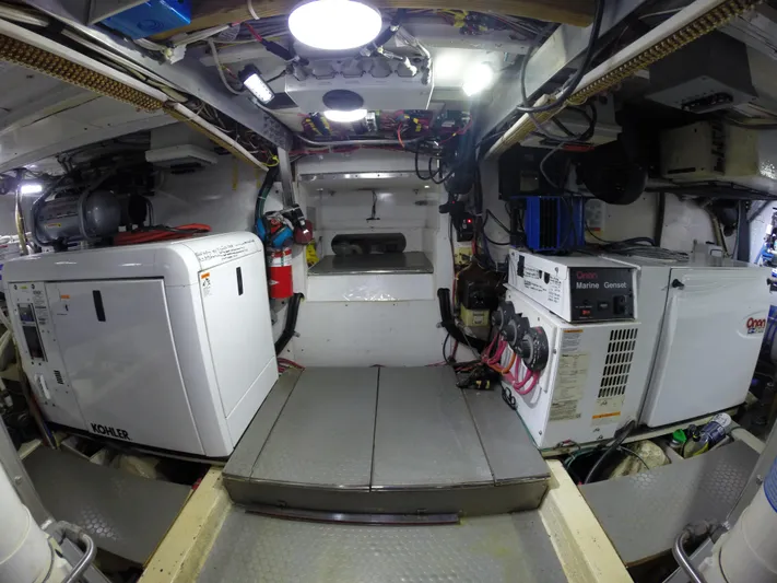 Wined Up Yacht Photos Pics Engine room of a 1973 Hatteras 53 yacht with Kohler and Onan generators.