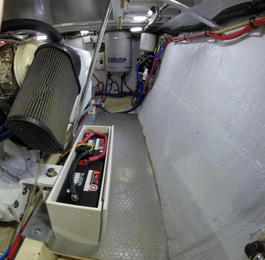 Wined Up Yacht Photos Pics Engine room of a 1973 Hatteras 53 yacht with batteries and wiring.