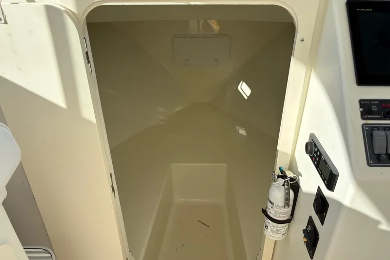  Yacht Photos Pics Interior view of 2021 Composite Yacht CY32 Chesapeake, featuring control panel and storage area.