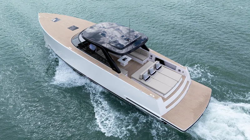  Yacht Photos Pics 2024 VanDutch 56 luxury yacht cruising on open water.