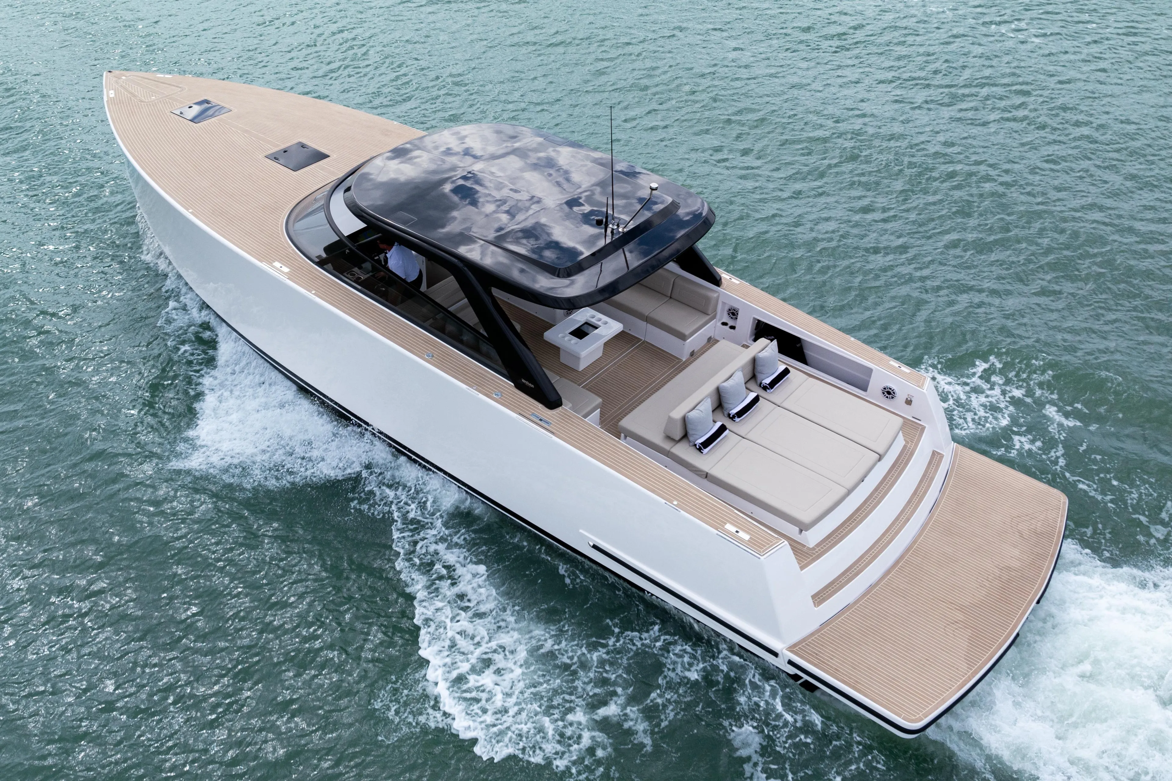 2024 VanDutch 56 luxury yacht cruising on open water.