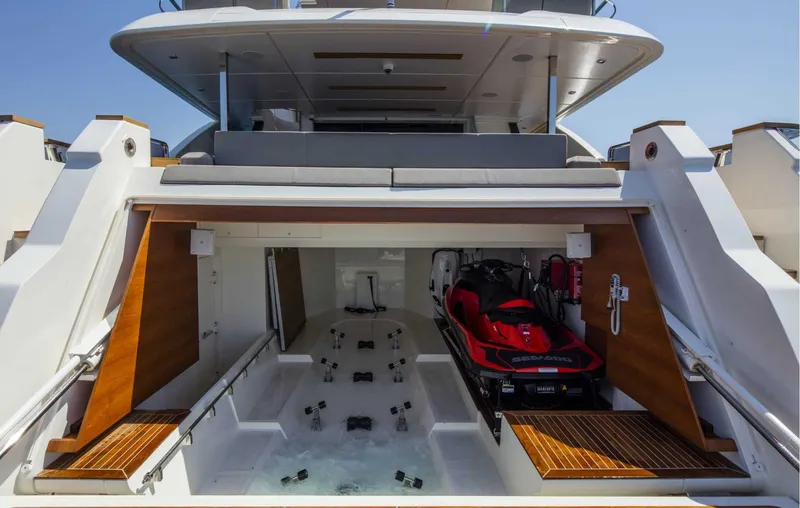  Yacht Photos Pics Luxury yacht Custom Line Navetta 33, 2025 model, featuring a jet ski garage.