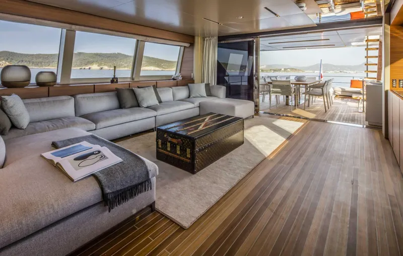  Yacht Photos Pics Luxurious interior of 2025 Custom Line Navetta 33 yacht with elegant seating and ocean view.