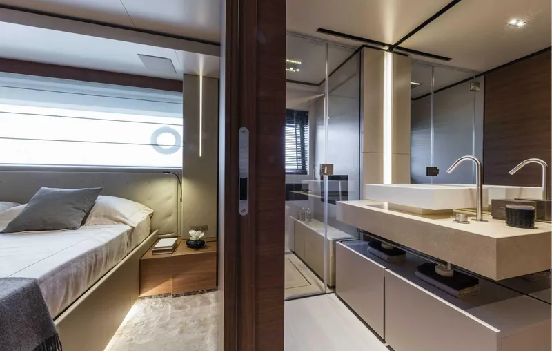  Yacht Photos Pics Luxurious bedroom and bathroom interior on 2025 Custom Line Navetta 33 yacht.