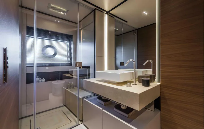  Yacht Photos Pics Luxurious bathroom interior on 2025 Custom Line Navetta 33 yacht, featuring modern fixtures and elegant design.