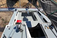 Cockpit view of 2002 Custom TRIMARAN PULSAR 33 sailboat with winches and rigging.